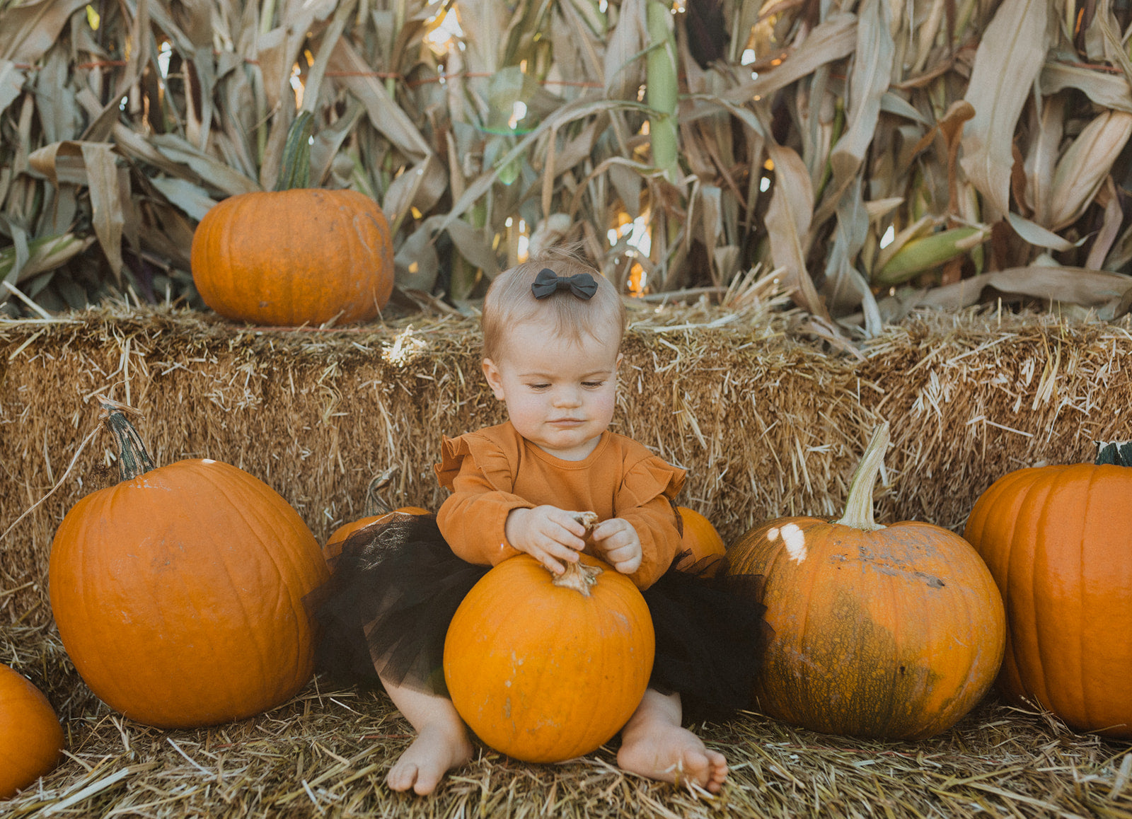 Pumpkin Flutter Long Sleeve Baby Onesie - Noelle Childrens Boutique
